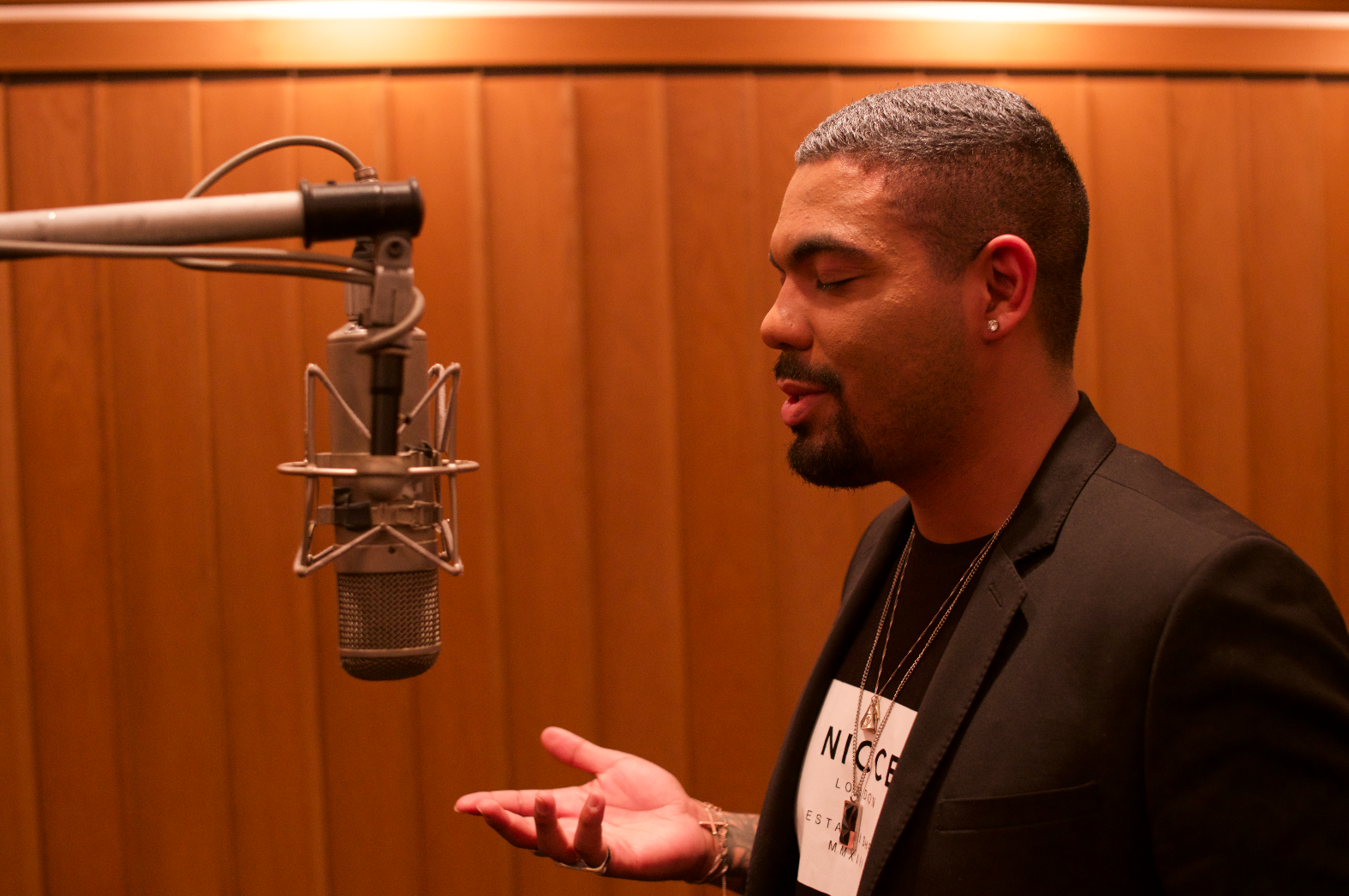 Artist recording vocals in the studio
